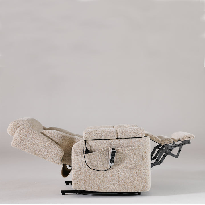 Dynox X5 in near lay-flat position, side view · five-motor reclining sequence · Designed in New Jersey